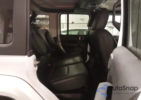 2023 Jeep Wrangler Sahara 4Xe z USA, uszkodzony, nr VIN 1C4JJXP6XPW641653